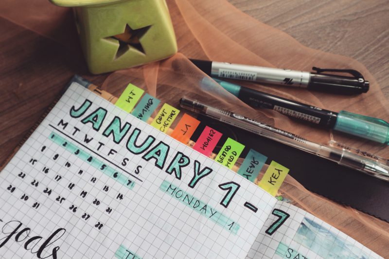 planning calendar with SMART goals and tabs